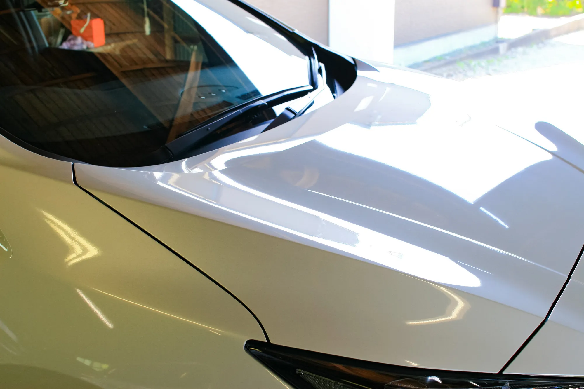 コーティング被膜が塗装を守るイメージ図